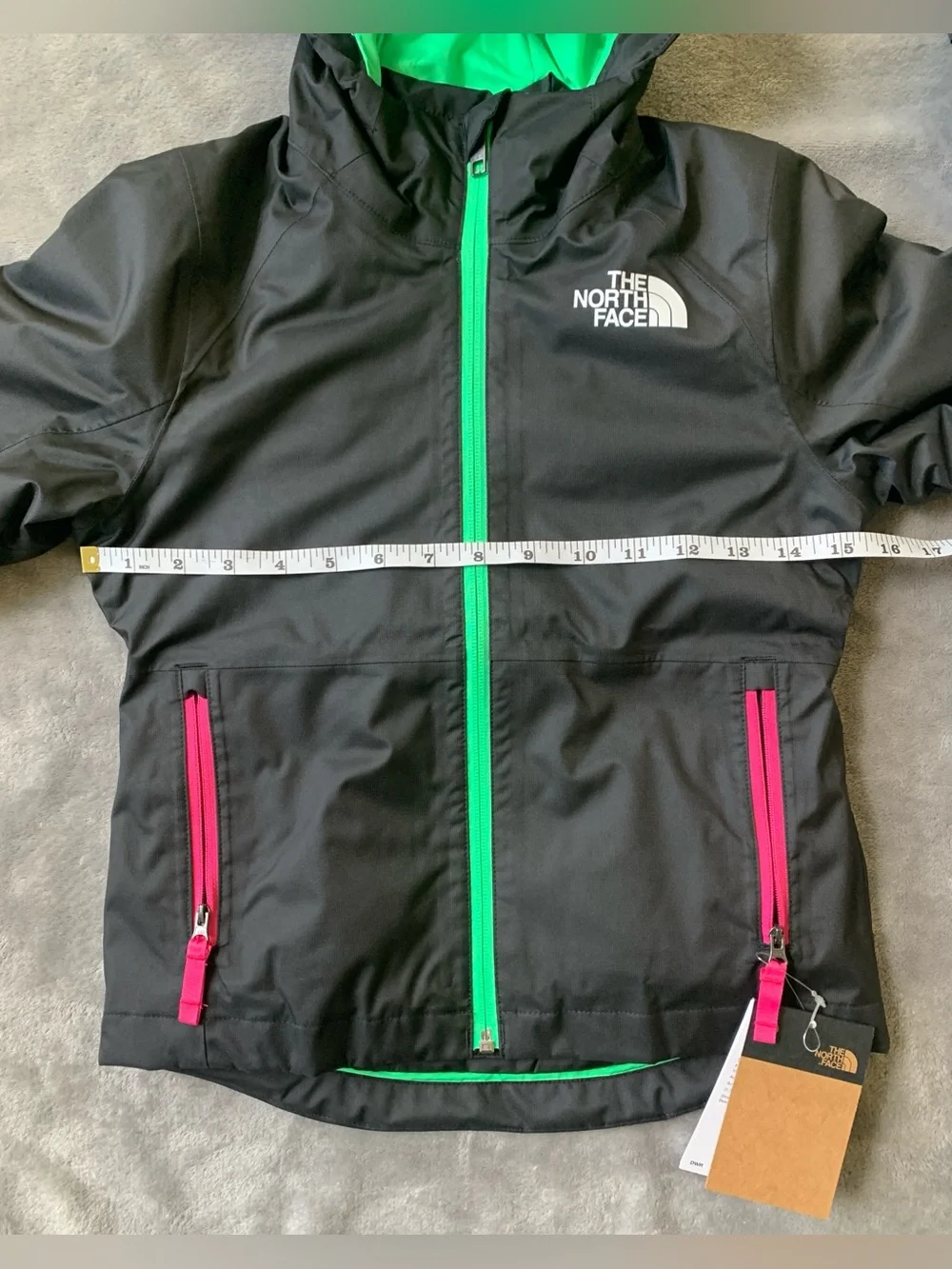 The North Face Black Hooded Jacket with Green Lining & Pink Zippers